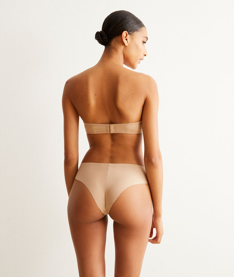 Sujetador bandeau nude de microfibra nude.
