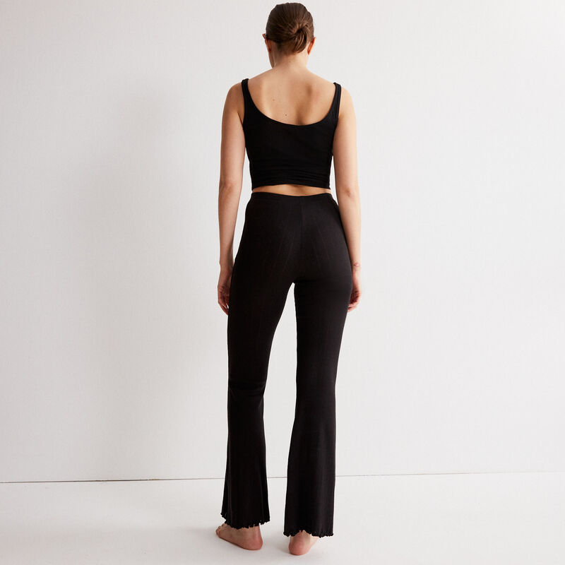 Pantalón acampanado de punto con puntitos - negro Pantalón acampanado de punto con puntitos - negro;