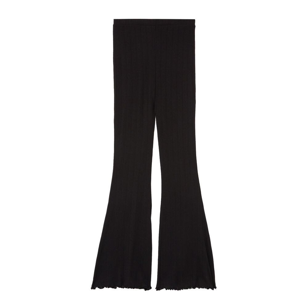 Pantalón acampanado de punto con puntitos - negro negro.