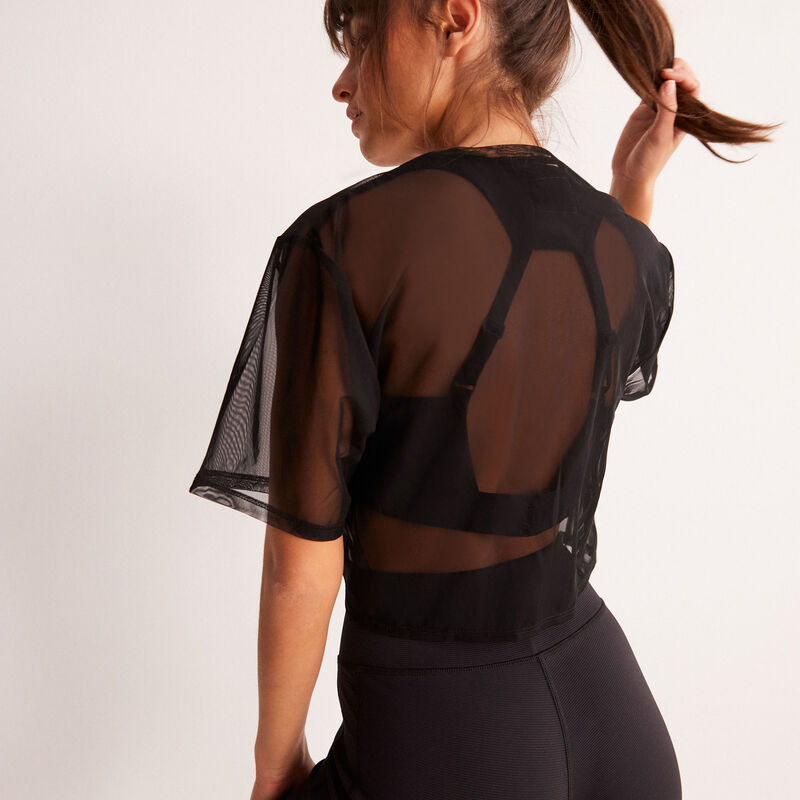 Top deportivo transparente con detalle de lazo - negro Top deportivo transparente con detalle de lazo - negro;