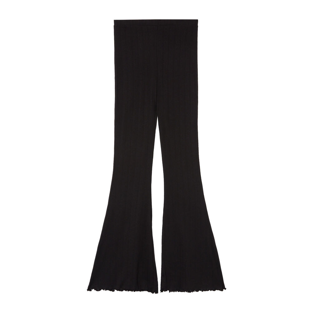 Pantalón acampanado de punto con puntitos - negro negro.