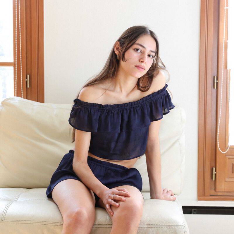 Top fluido con volante - azul Top fluido con volante - azul;