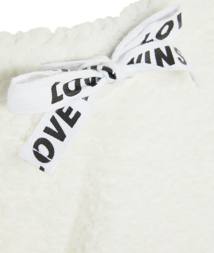 Pantalón polar con detalle de cordón polipantiz blanco roto.