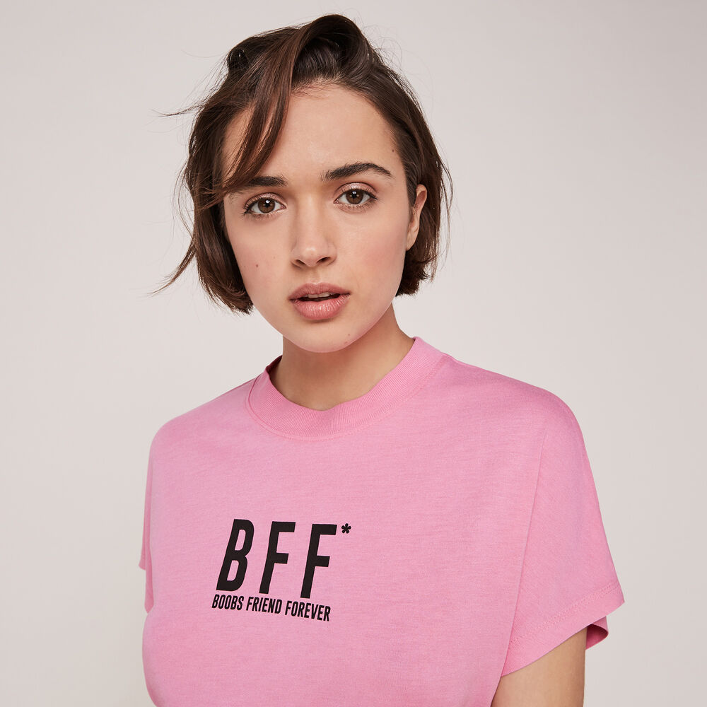 Top de manga corta interyourminiz rosa.