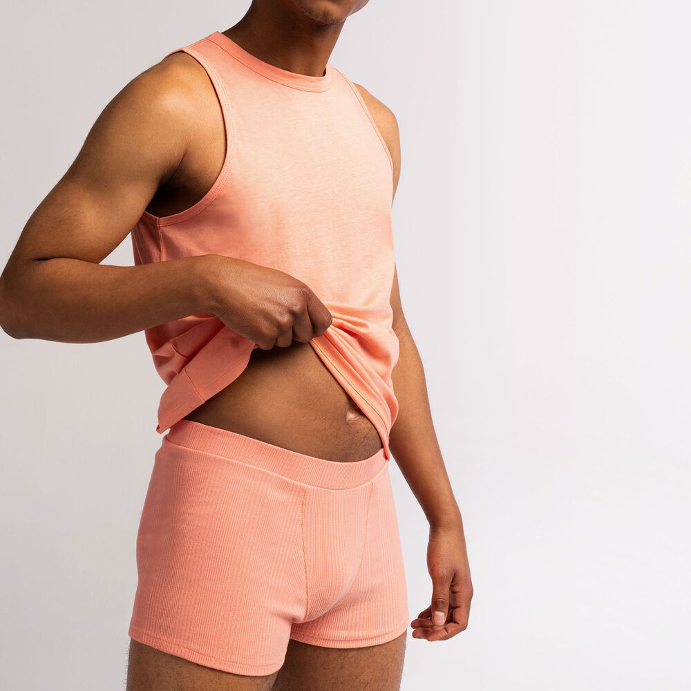 Short unisex de punto liso - melocotón naranja.